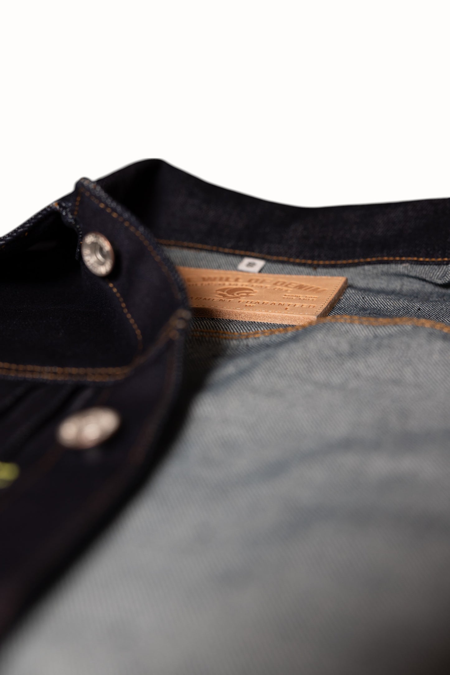 Close up view of leather tag thickness